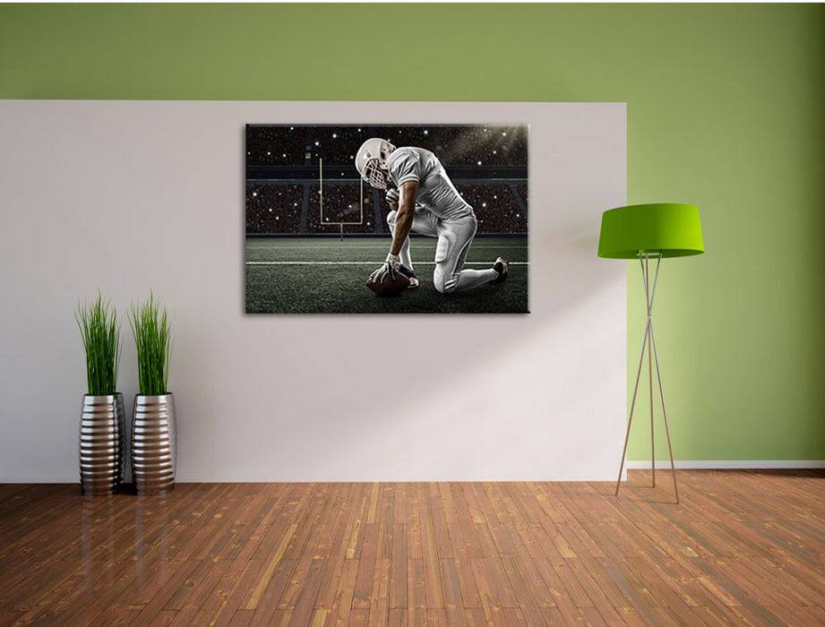 Pixxprint knieender Football-Spieler, Leinwandbild Cyber Monday