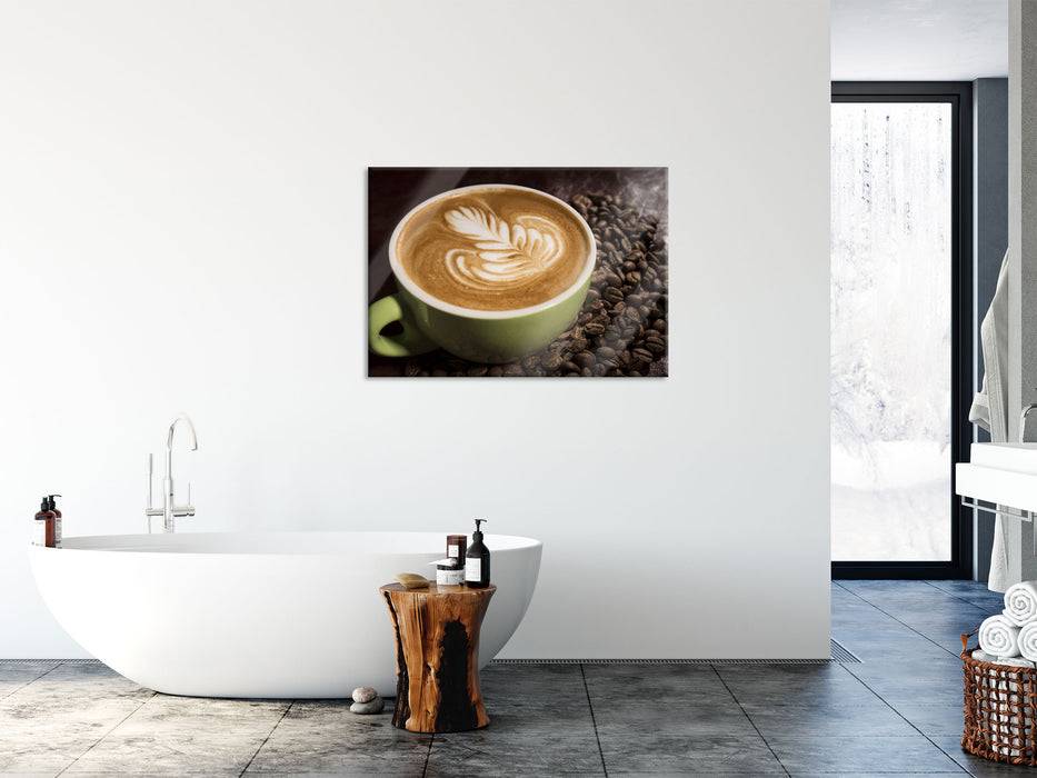 Pixxprint Cappucino zwischen Kaffeebohnen, Glasbild Rabatte dieses Monats