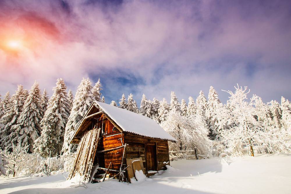 Pixxprint Holzhütte im Schnee, Glasbild Exklusivangebot